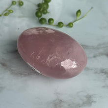 Rose Quartz Palm Stone specimen