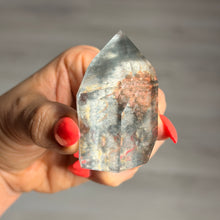 Blue Tara Quartz specimen BTQ#37 held in hand for scale
