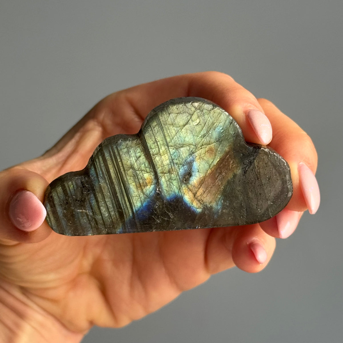 Labradorite carved cloud specimen — close-up of blue flash