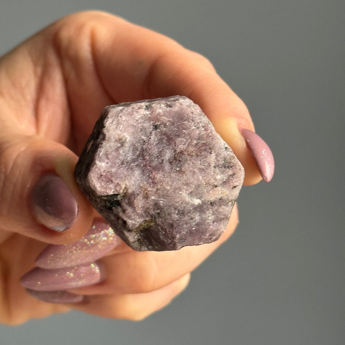 Ruby hexagon crystal specimen — side view