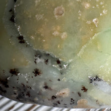 Chrysoprase palm stone — close-up of apple-green colour