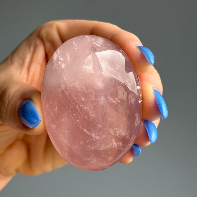Rose Quartz Palm Stone specimen
