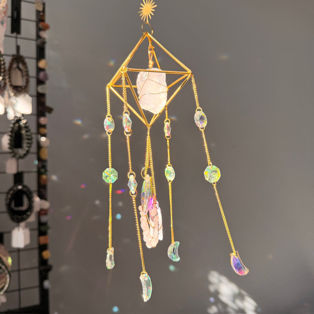 SunJewelz Wearable Sun-catcher with Wire Wrapped Rose Quartz – Wholehearted Crystal Creations