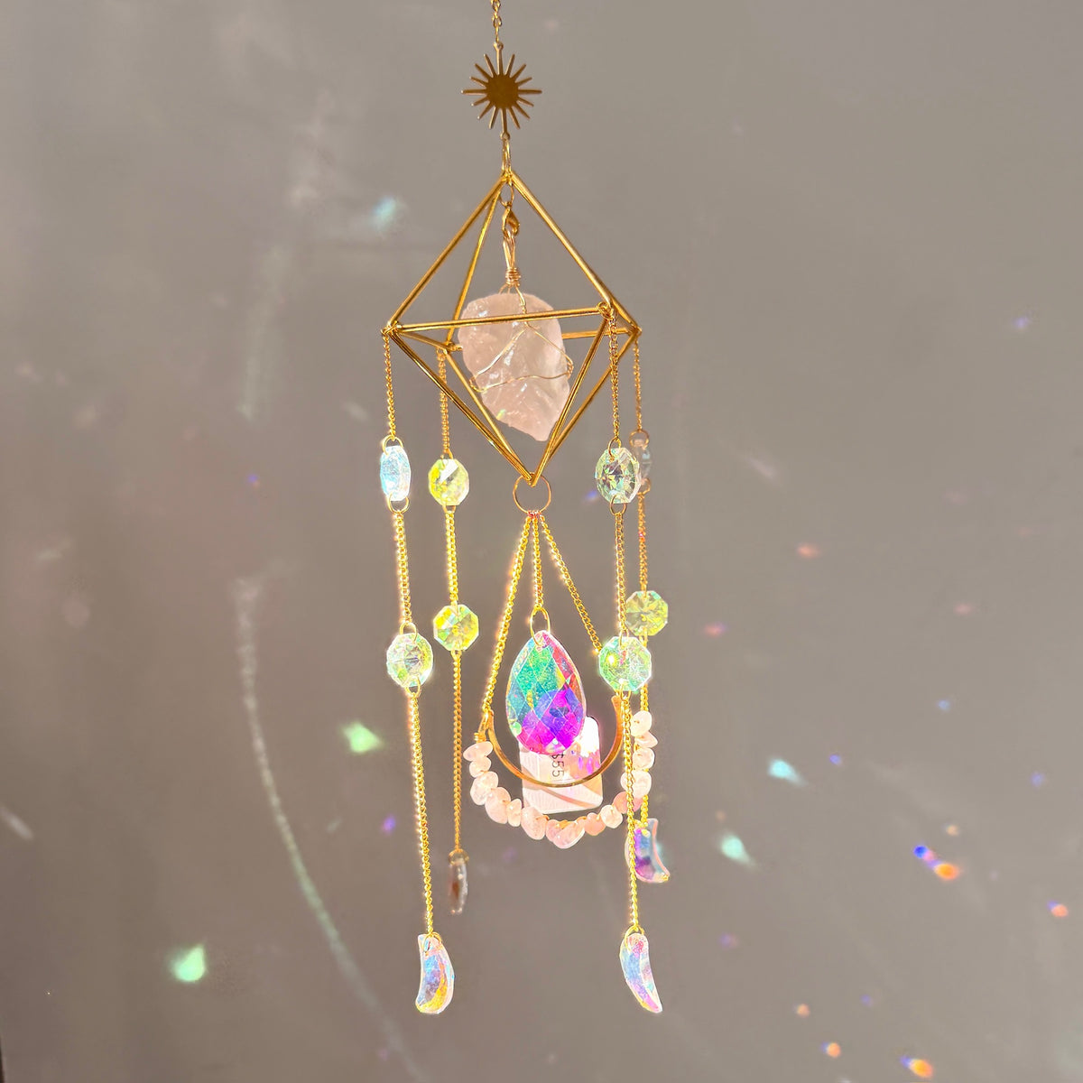SunJewelz Wearable Sun-catcher with Wire Wrapped Rose Quartz – Wholehearted Crystal Creations