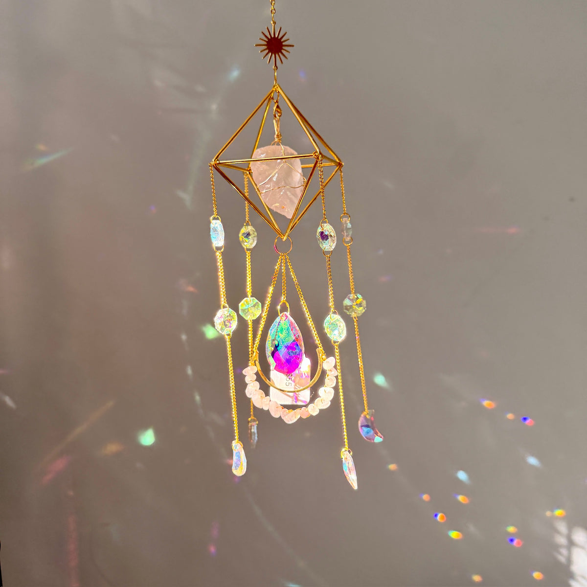SunJewelz Wearable Sun-catcher with Wire Wrapped Rose Quartz – Wholehearted Crystal Creations