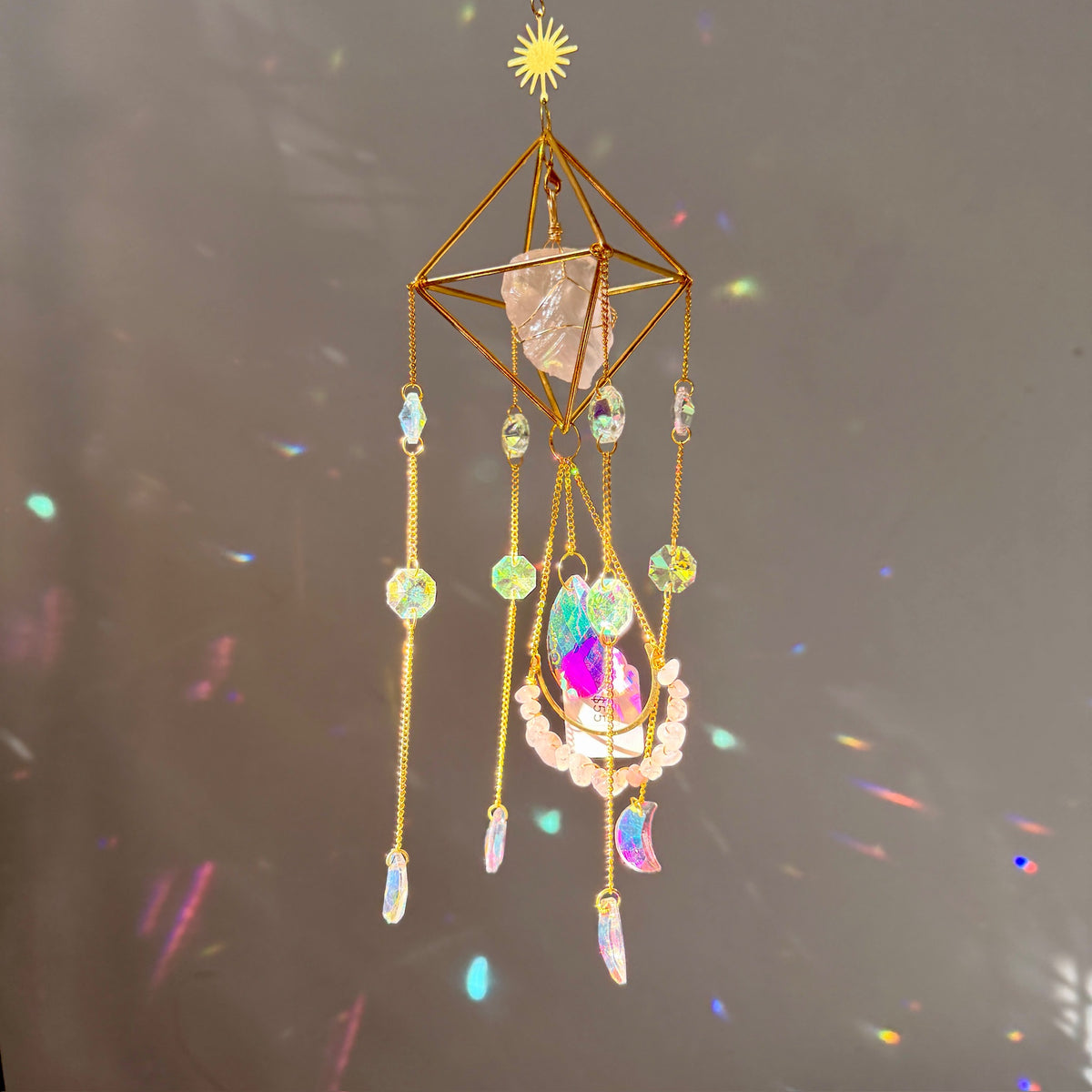 SunJewelz Wearable Sun-catcher with Wire Wrapped Rose Quartz – Wholehearted Crystal Creations