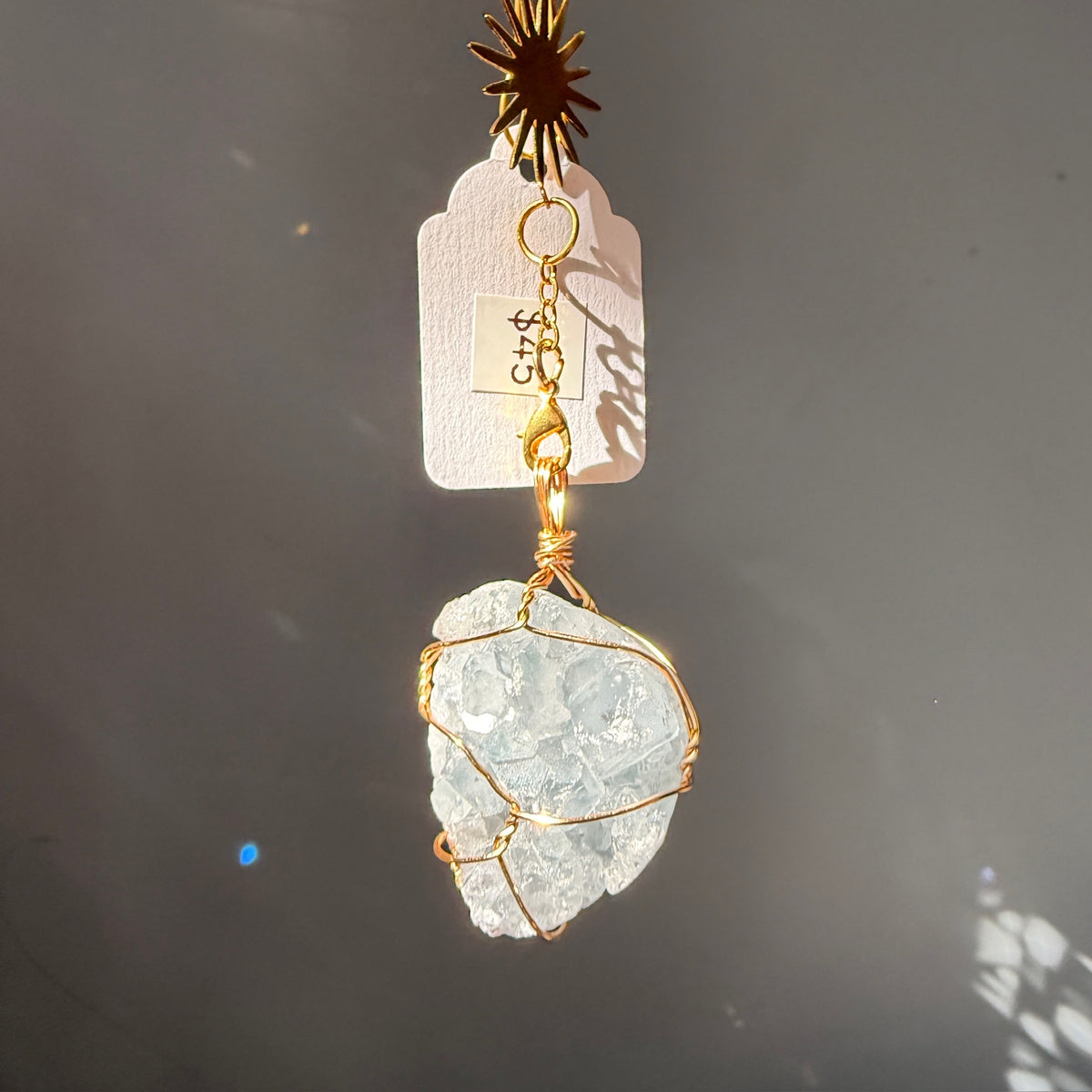 SunJewelz Wearable Sun-catcher with Wire Wrapped Celestite – Wholehearted Crystal Creations