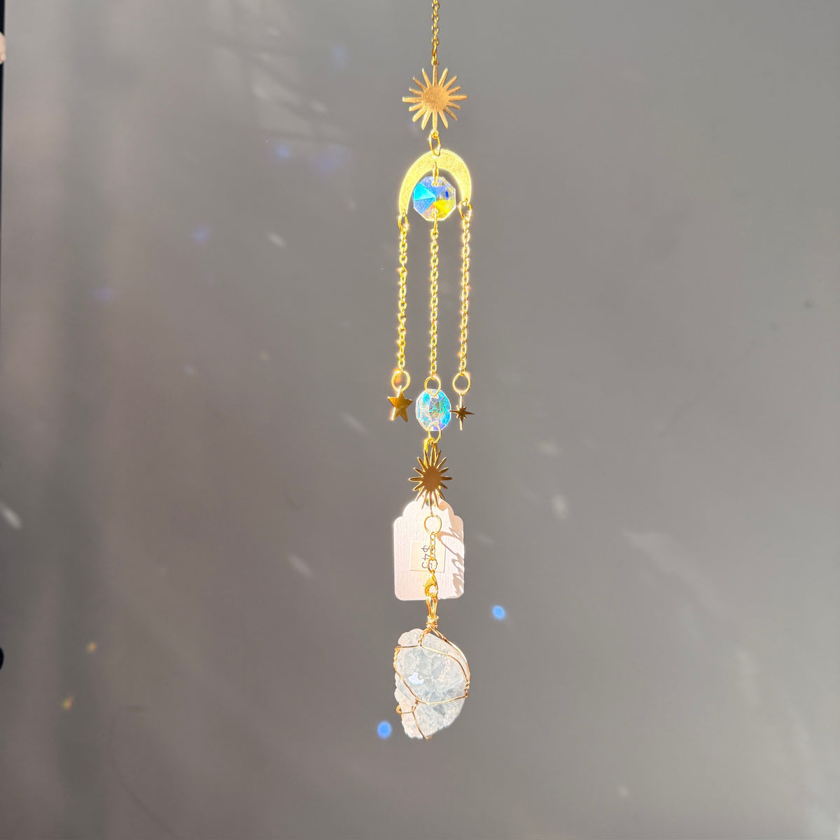 SunJewelz Wearable Sun-catcher with Wire Wrapped Celestite – Wholehearted Crystal Creations