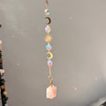 SunJewelz Wearable Sun-catcher with Wire Wrapped Rose Quartz – Wholehearted Crystal Creations