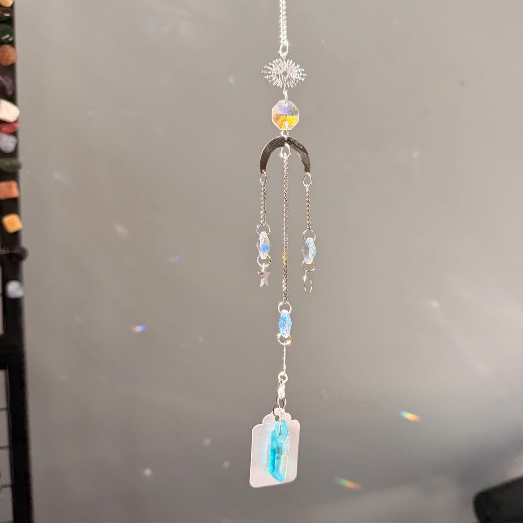 SunJewelz Wearable Sun-catcher with Wire Wrapped Aqua Aura Quartz – Wholehearted Crystal Creations
