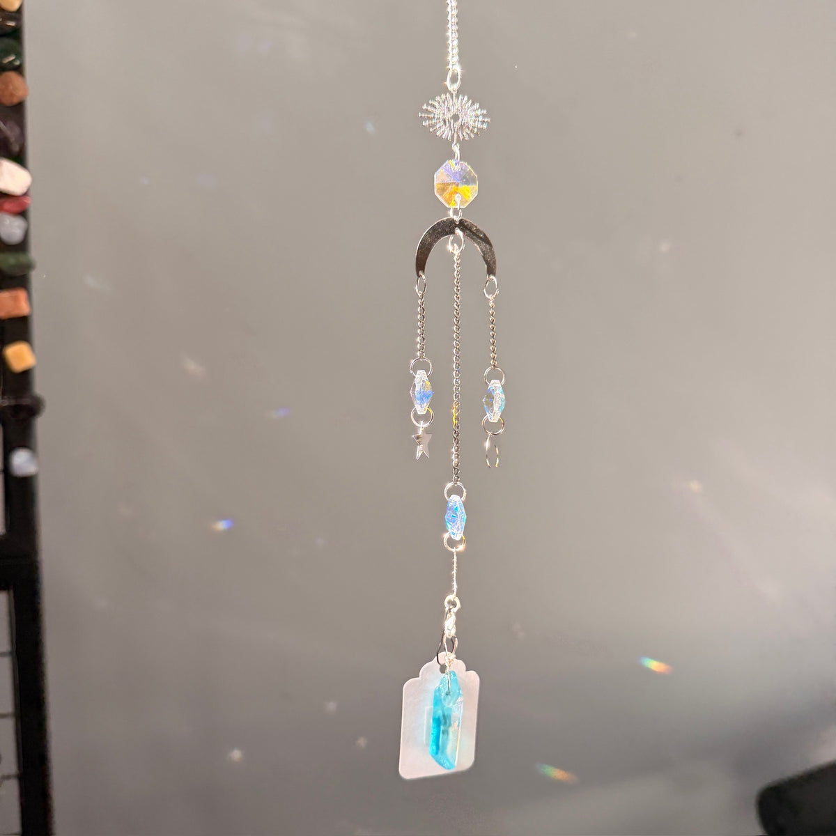 SunJewelz Wearable Sun-catcher with Wire Wrapped Aqua Aura Quartz – Wholehearted Crystal Creations