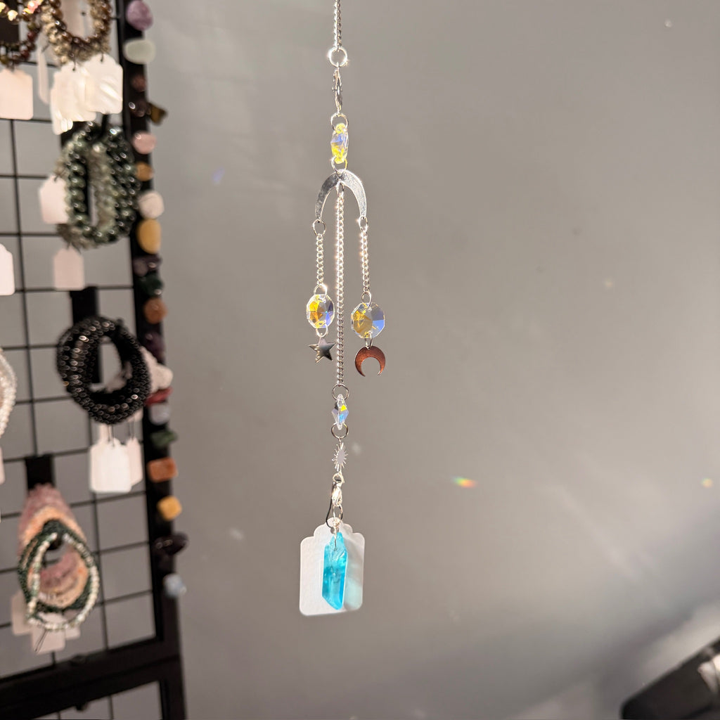 SunJewelz Wearable Sun-catcher with Wire Wrapped Aqua Aura Quartz – Wholehearted Crystal Creations