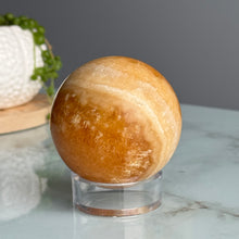 Orange Calcite Polished Sphere Specimen