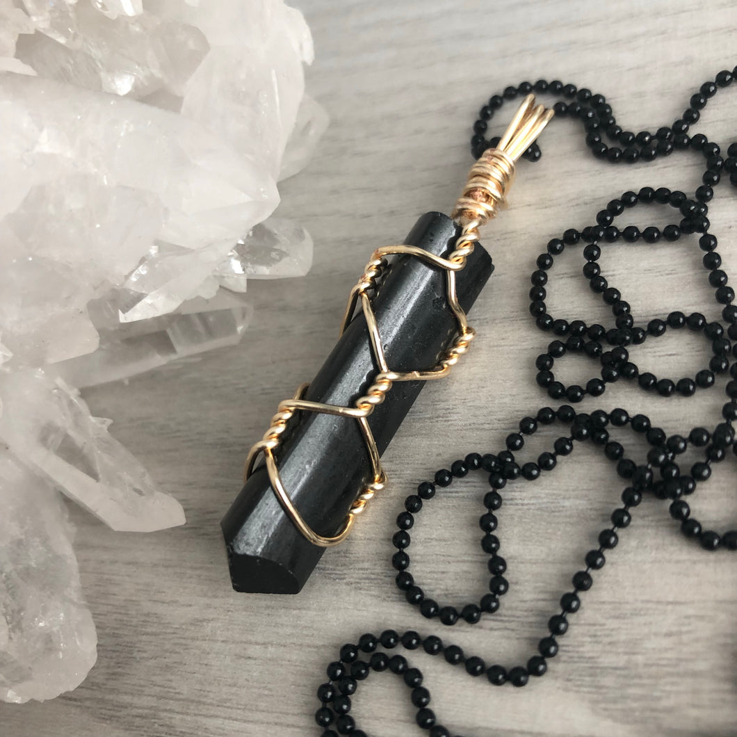 Black Tourmaline gold wire wrapped necklace on black chain